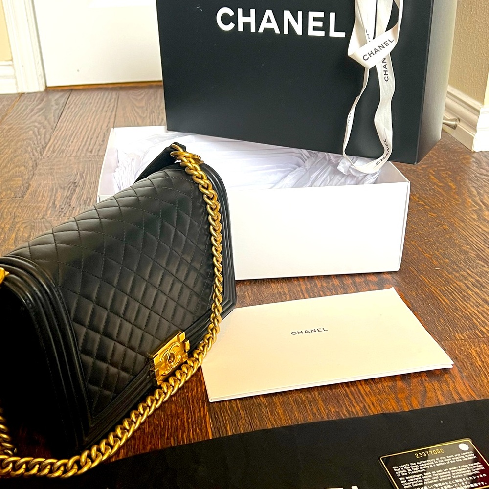 Authentic Chanel Black and Gold Leboy Medium, lamb skin Original box dust bag